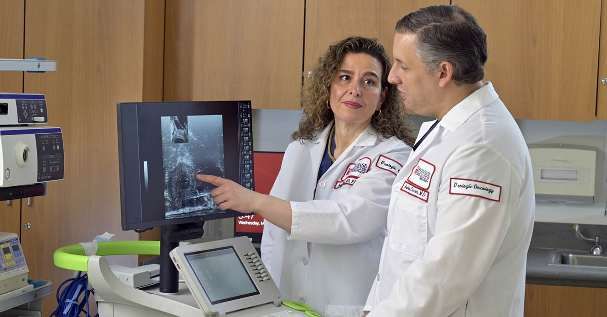 Dr. Viterbo (left) and Dr. Correa, urologic oncologists at Fox Chase, utilizing the ExactVu™ micro-ultrasound system for prostate cancer diagnosis.